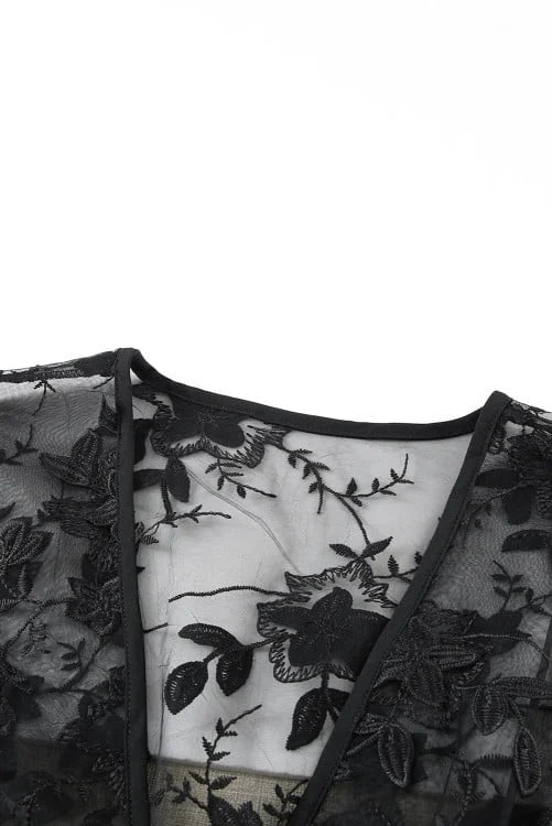 Black floral lace top on a white background
