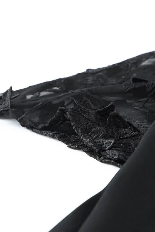 Black lace fabric on a white background