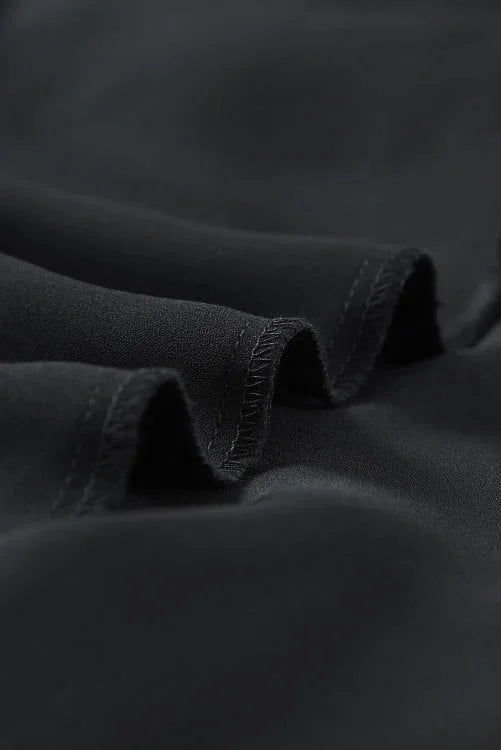Close-up of dark fabric with folds