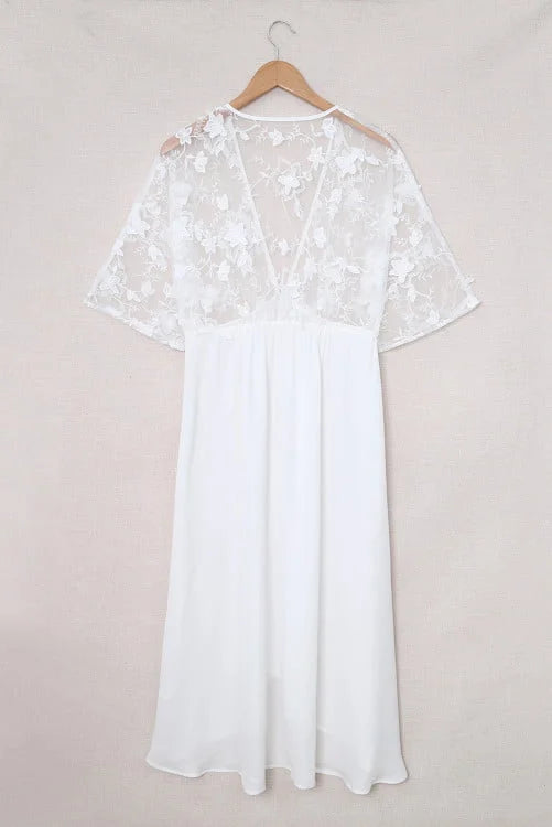 White lace top and skirt set on a beige background