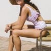 Buy swimwear for women at a store.