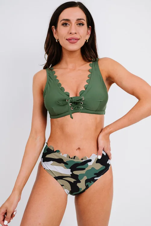 Buy swimwear for women at a store.