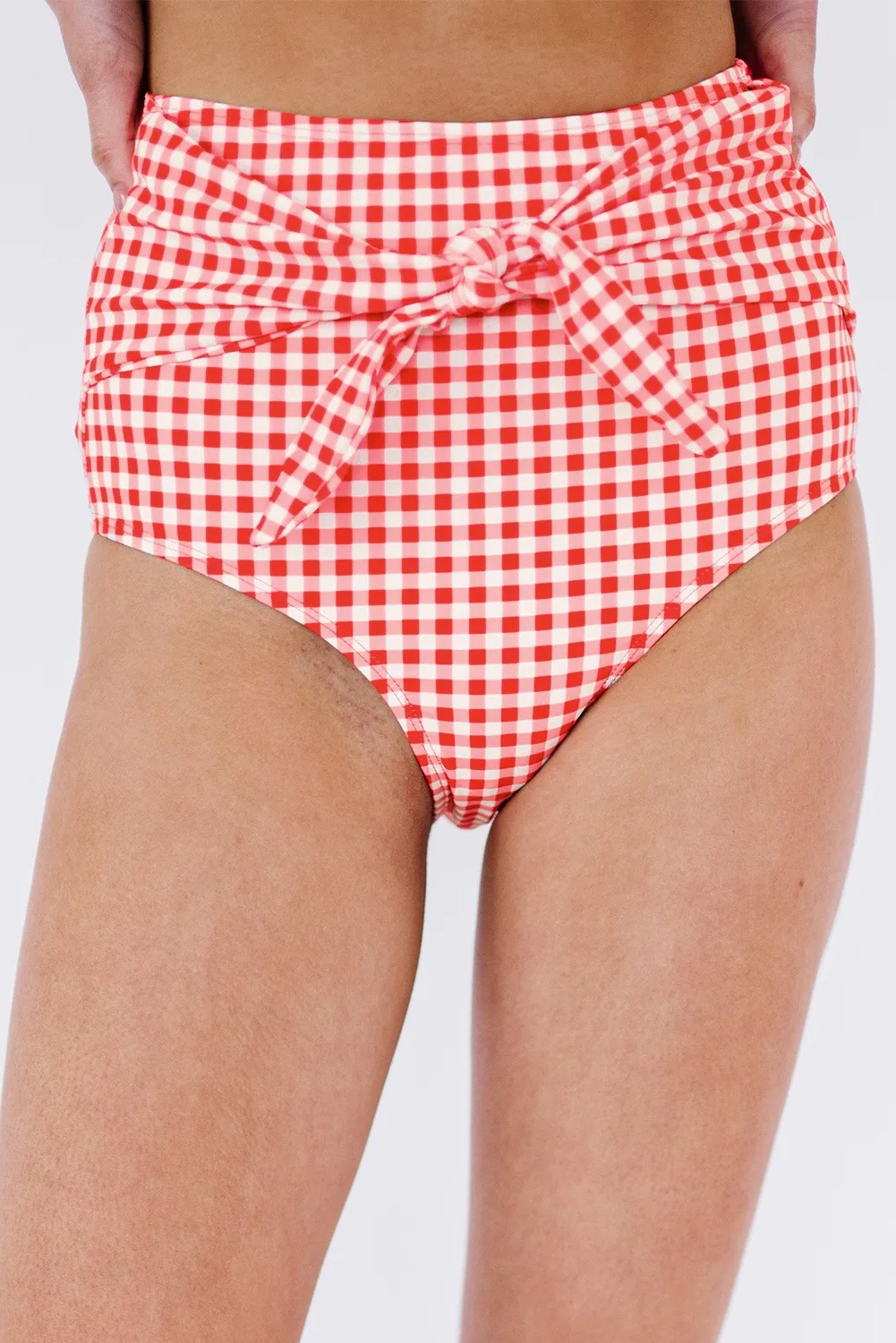 Buy swimwear for women at a store.
