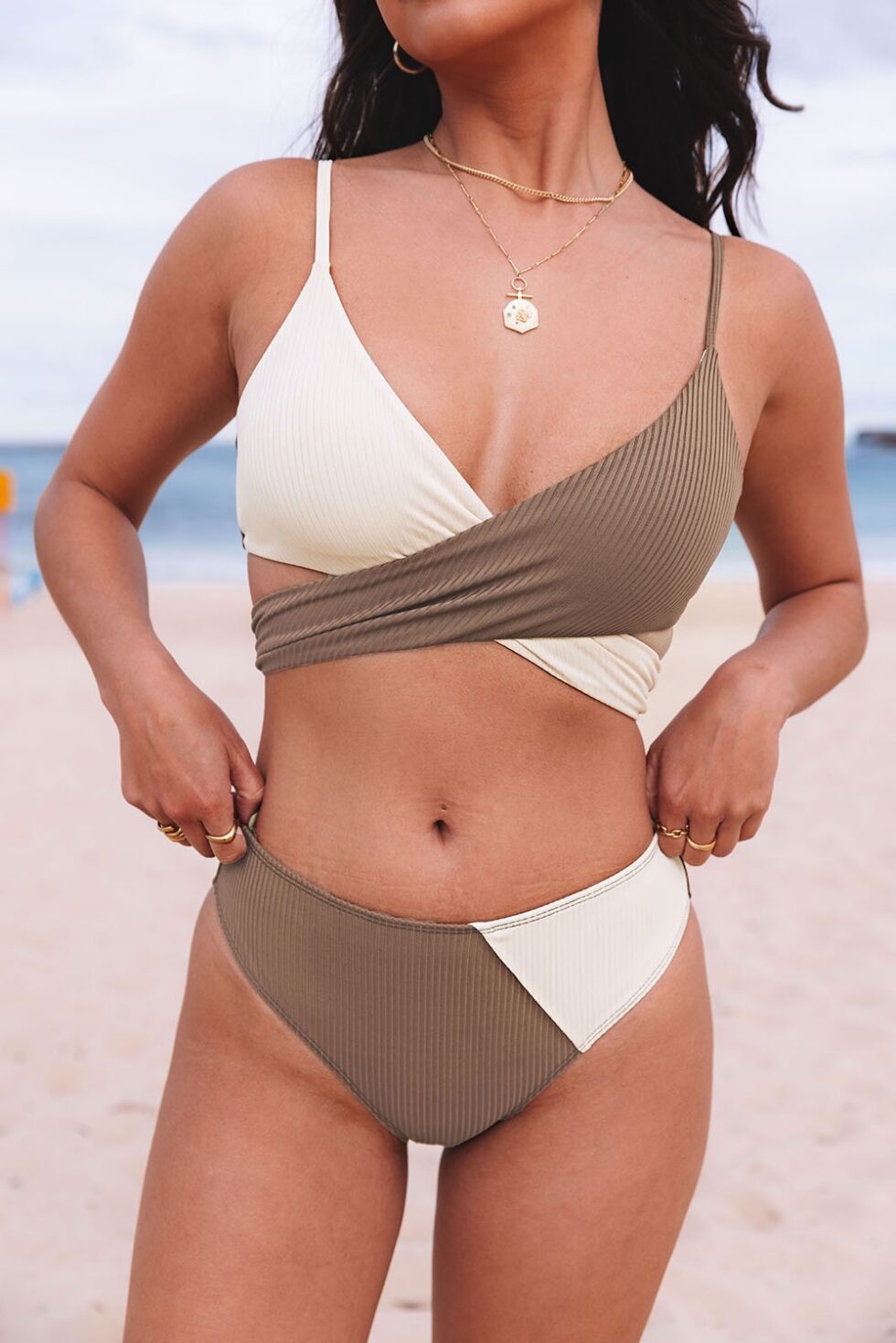 Buy swimwear for women at a store.